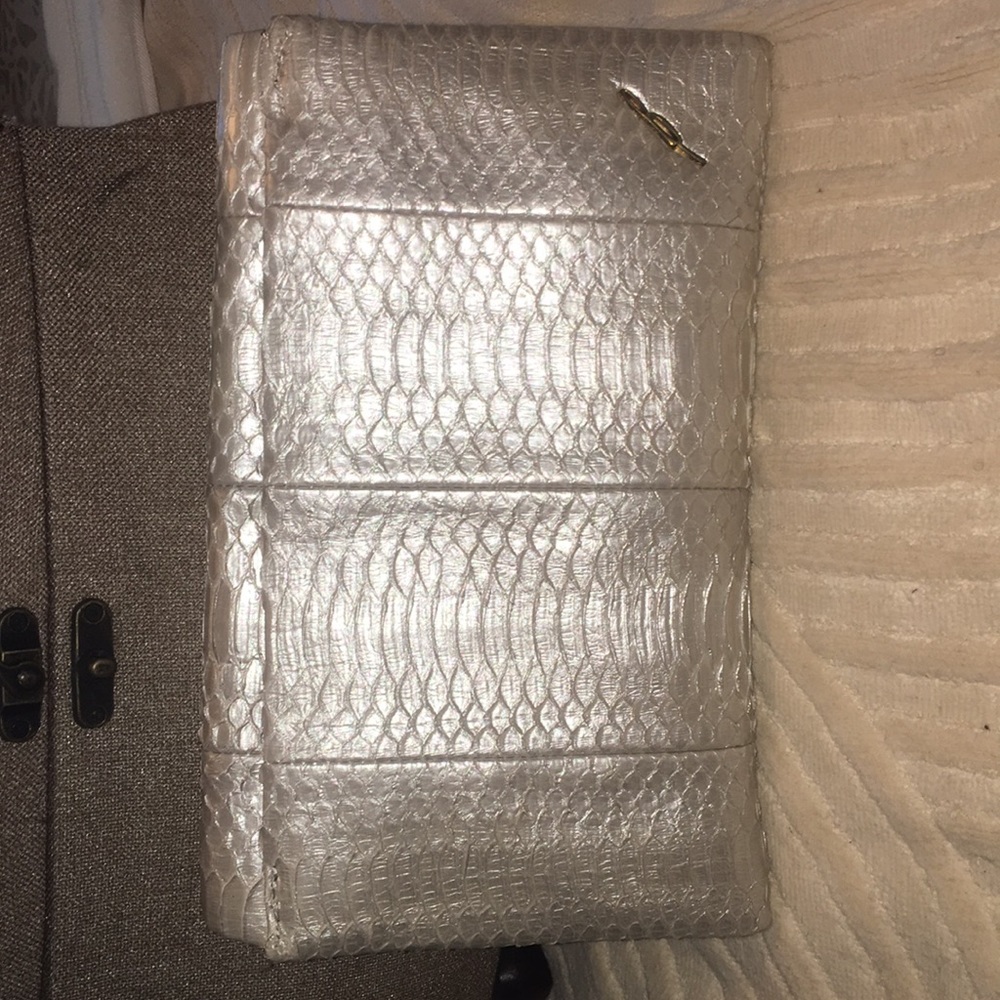 B by Brian Atwood mother of pearl color clutch